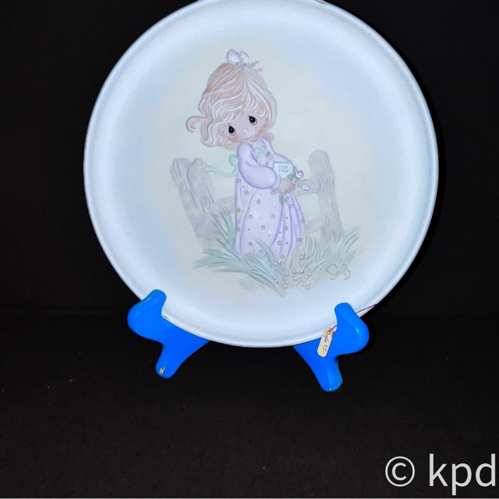 1984 Precious Moments “The Voice of Spring,” collectors plate
